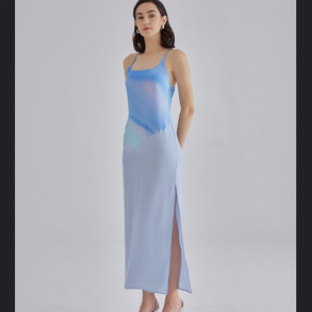 Beautiful light blue silk dress. Never been worn.